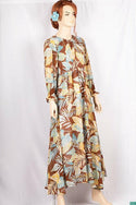 Ladies Smokey ruffles full sleeve double layered long dress in various colours print with a huge, beautiful flares and also can tie up with a fashionable belt of feather.