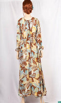 Ladies Smokey ruffles full sleeve double layered long dress in various colours print with a huge, beautiful flares and also can tie up with a fashionable belt of feather.
