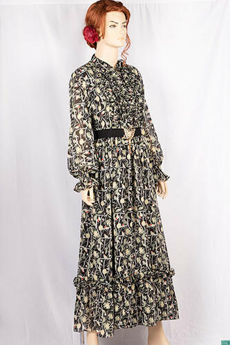 Ladies Smokey ruffles full sleeve double layered long dress with cuffed neck and ruffles chest in various colours print with a wide beautiful flare.