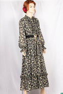 Ladies Smokey ruffles full sleeve double layered long dress with cuffed neck and ruffles chest in various colours print with a wide beautiful flare.