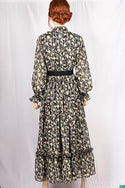 Ladies Smokey ruffles full sleeve double layered long dress with cuffed neck and ruffles chest in various colours print with a wide beautiful flare.