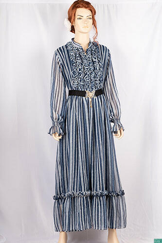 Ladies Smokey ruffles full sleeve double layered long dress with cuffed neck and ruffles chest in various colours print with a wide beautiful flare.