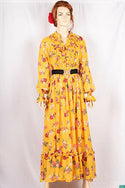 Ladies Smokey ruffles full sleeve double layered long dress with cuffed neck and ruffles chest in various colours print with a wide beautiful flare.
