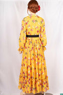 Ladies Smokey ruffles full sleeve double layered long dress with cuffed neck and ruffles chest in various colours print with a wide beautiful flare.