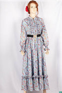 Ladies Smokey ruffles full sleeve double layered long dress with cuffed neck and ruffles chest in various colours print with a wide beautiful flare.