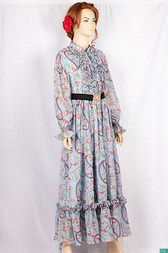 Ladies Smokey ruffles full sleeve double layered long dress with cuffed neck and ruffles chest in various colours print with a wide beautiful flare.