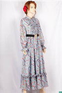 Ladies Smokey ruffles full sleeve double layered long dress with cuffed neck and ruffles chest in various colours print with a wide beautiful flare.