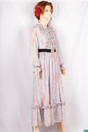 Ladies Smokey ruffles full sleeve double layered long dress with cuffed neck and ruffles chest in various colours print with a wide beautiful flare.