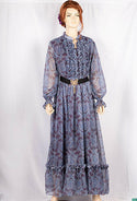 Ladies Smokey ruffles full sleeve double layered long dress with cuffed neck and ruffles chest in various colours print with a wide beautiful flare.
