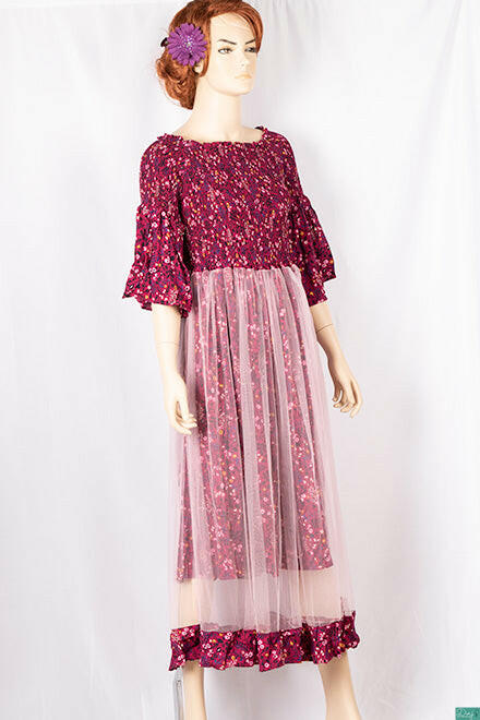 Ladies double layered long frock dress in various colours floral print with 3/4 Smokey ruffles sleeves and stretchy Smokey body.