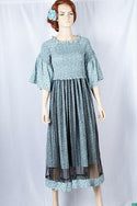 Ladies double layered long frock dress in various colours floral print with 3/4 Smokey ruffles sleeves and stretchy Smokey body.