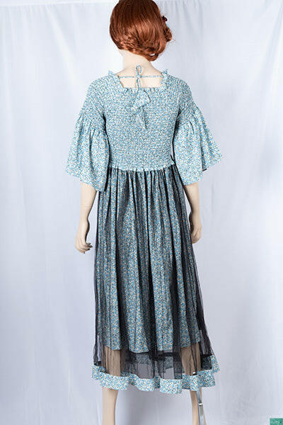 Ladies double layered long frock dress in various colours floral print with 3/4 Smokey ruffles sleeves and stretchy Smokey body.