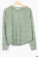 Ladies full sleeve casual fit round neck knitwear.