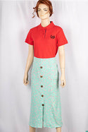 Ladies casual fit mid length stretchy, stylish middle split skirts with buttons.