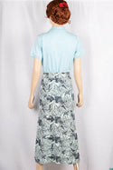Ladies casual fit mid length stretchy, stylish middle split skirts with buttons.