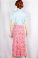 Ladies casual fit mid length stretchy, stylish middle split skirts with buttons.