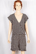 Ladies casual fit V neck short sleeve stylish romper with pockets in Pink Floral Print on Black.