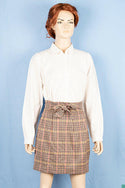 Ladies casual fit short length   Stretchy Stylish skirts with a fashionable bow belt.