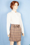 Ladies casual fit short length   Stretchy Stylish skirts with a fashionable bow belt.