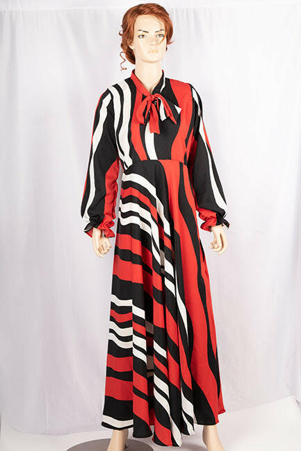 Ladies cuffed neck with lace Smokey ruffles full sleeve long gown dress in various colours print with a wide beautiful flare.