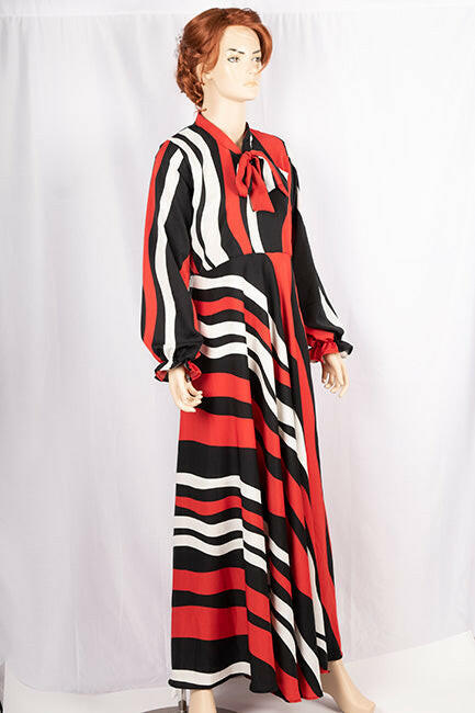 Ladies cuffed neck with lace Smokey ruffles full sleeve long gown dress in various colours print with a wide beautiful flare.