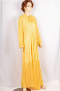 Ladies cuffed neck with lace Smokey ruffles full sleeve long gown dress in various colours print with a wide beautiful flare.