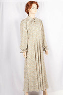 Ladies cuffed neck with lace Smokey ruffles full sleeve long gown dress in various colours print with a wide beautiful flare.