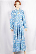 Ladies cuffed neck with lace Smokey ruffles full sleeve long gown dress in various colours print with a wide beautiful flare.