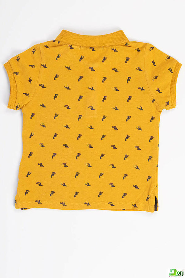 Boy's short sleeve slim fit polo with bird beak design in mustard yellow.