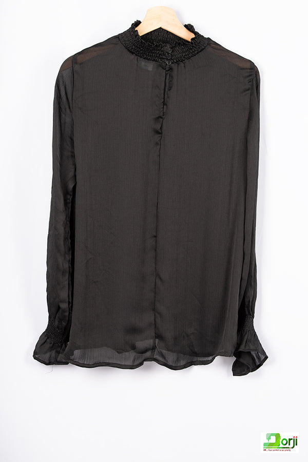 Black loose fit Ruffle ladies top with high ruffle neck & full ruffle sleeve.