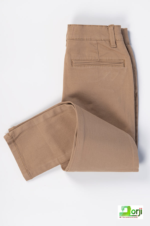 Girl's slim fit chino pants in Brown / Tan / Khaki.