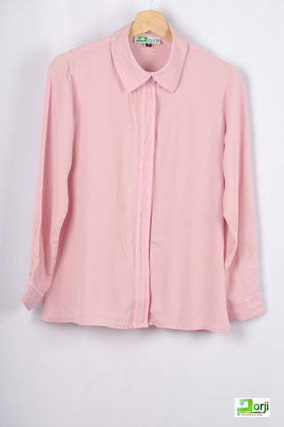 Pink loose fit full sleeve ladies shirt with pockets.