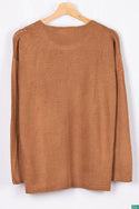 Ladies full sleeve net design round neck casual fit soft light knitwear.