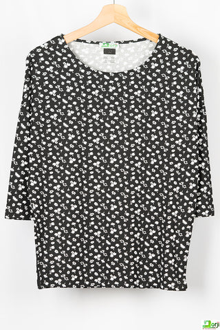 Ladies loose fit half sleeve round neck white floral long top in Black. A beautiful comfy top with 100% cotton.