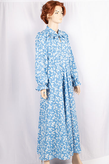 Ladies cuffed neck with lace Smokey ruffles full sleeve long gown dress in various colours print with a wide beautiful flare.
